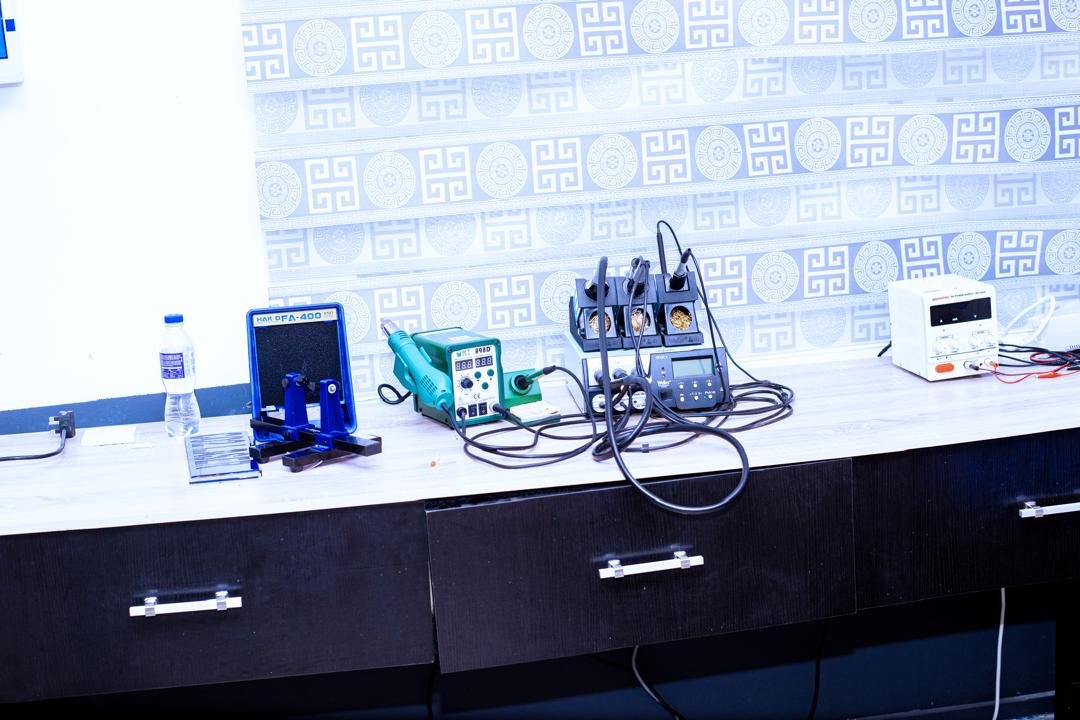 An electronics bench with instruments and components