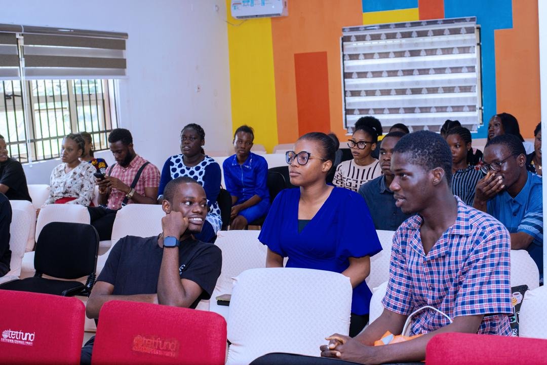 Participants seated in a learning session inside the UniPod